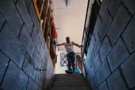 View looking up from basement during McCoy Contractors basement waterproofing work Milwaukee