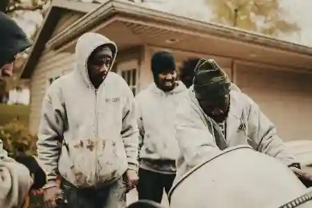 McCoy Contractors team at concrete mixer during foundation repair work Milwaukee