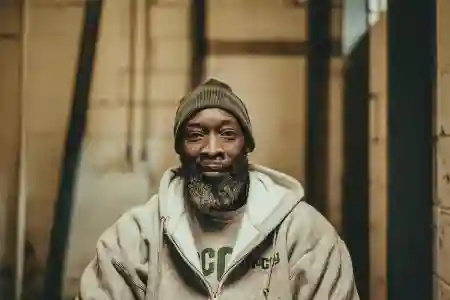 McCoy Contractors foundation repair team portrait in basement Milwaukee