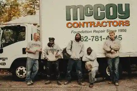McCoy Contractors foundation repair team outside company truck Milwaukee