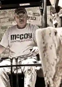 McCoy Contractors foreman working heavy machinery for excavation during foundation repair Milwaukee