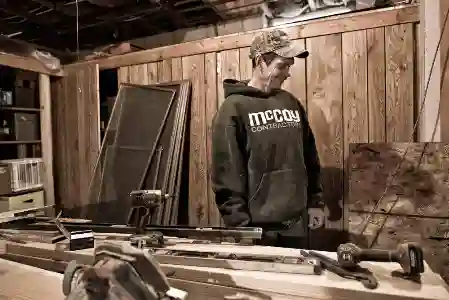 McCoy Contractors foundation repair crew at wood working shop Milwaukee