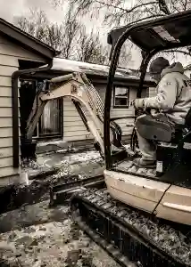 Steel beam installation for foundation support in Milwaukee by McCoy Contractors