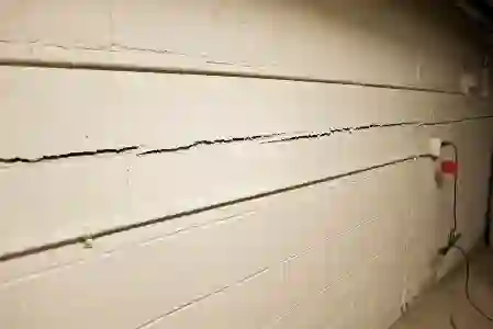 Wall crack and beam repair in Milwaukee by McCoy Contractors
