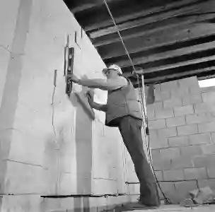 Vintage construction crew from McCoy Contractors Milwaukee - foundation repair specialists